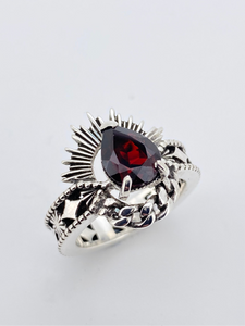 The Ertè - Pear cut Garnet